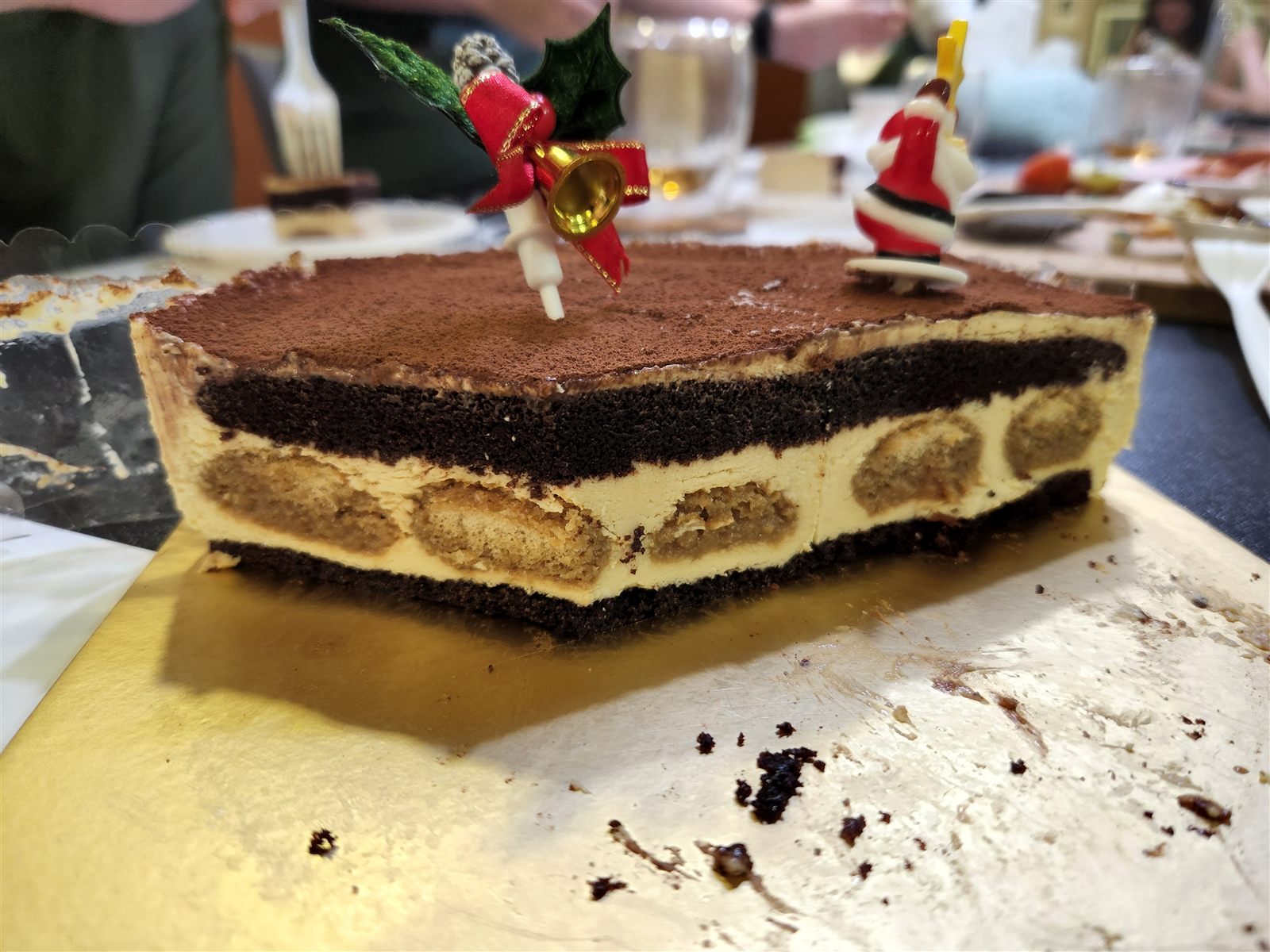 Layered gluten-free tiramisu with chocolate sponge and ladyfingers